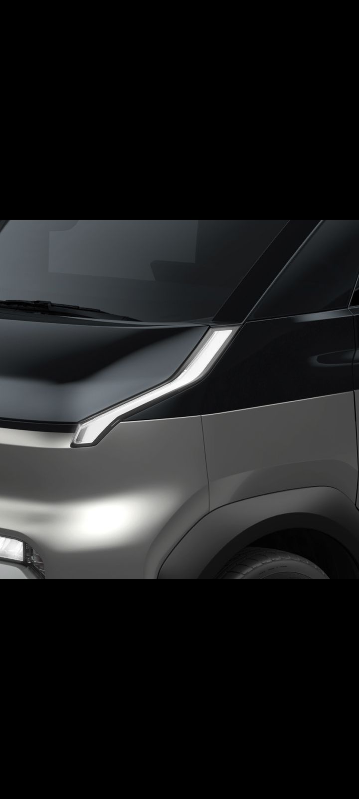 Nahaufnahme des Frontscheinwerfers und der Motorhaube des Kia PV5 Cargo.